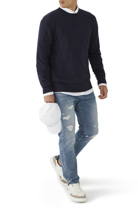 J24 Distressed Tapered Jeans